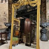 Monumental mirror Napoleon III in gilded wood with the profile of Apollo