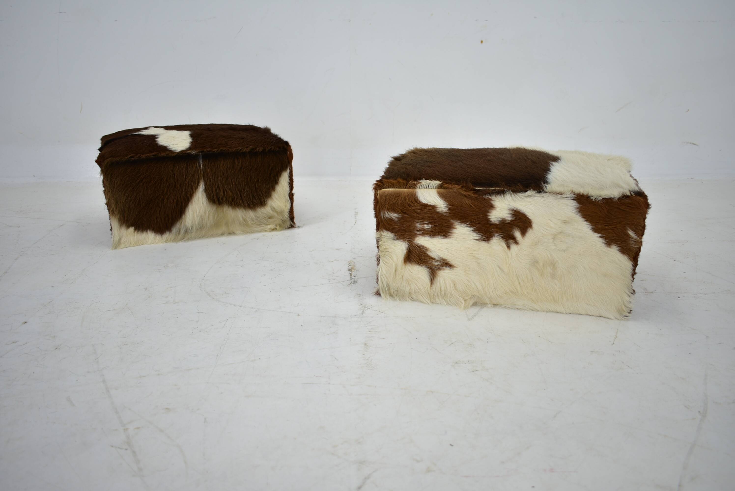 red brown leather cowhide footstools , poufs, 80s