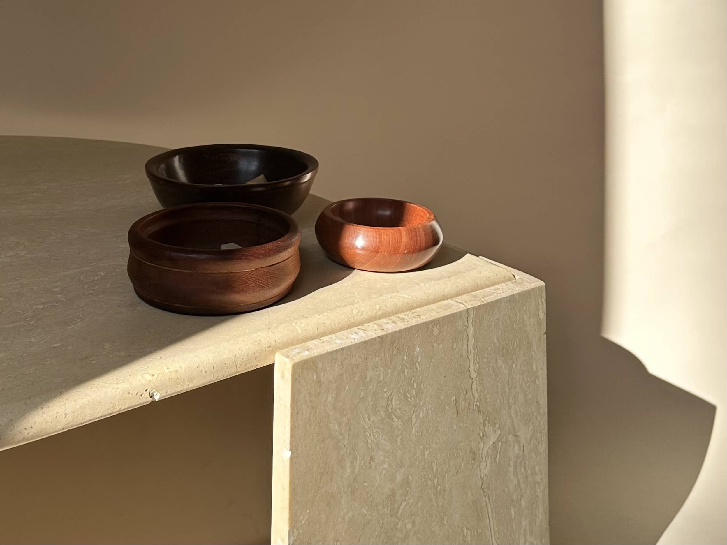 Travertine eye-shaped coffee table