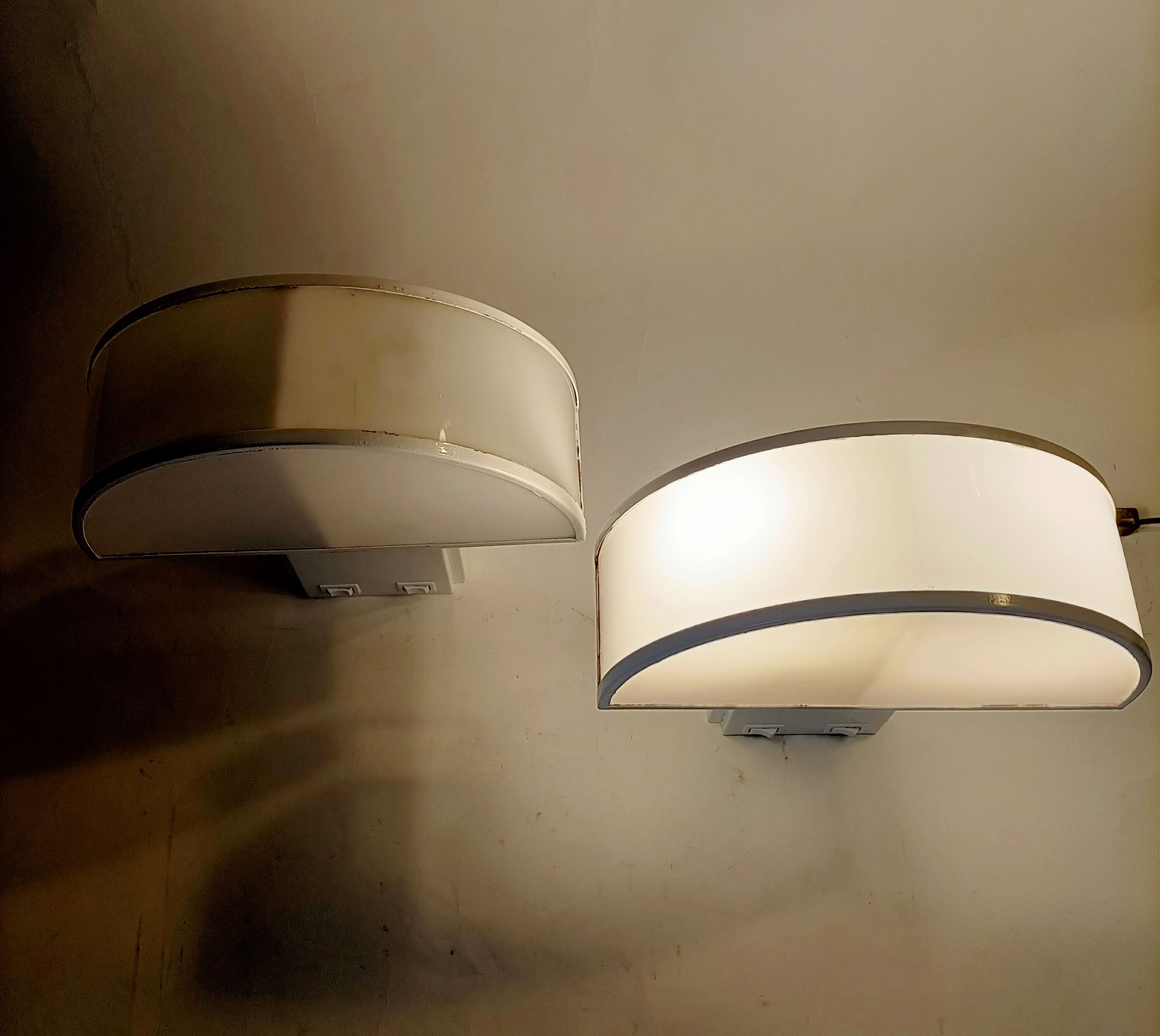 Pair of wall lamps with double switches model Olympe design Harvey Guzzini for ED 1970