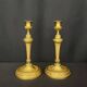 Pair of gilded bronze candlesticks in the Louis XVI style