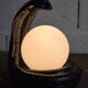 Vintage cobra lamp in black resin