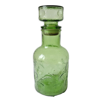 Green glass carafe bubbles