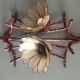 Pair of vintage appliques in metal and mother-of-Pearl