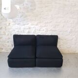 Pair of black Strafor armchairs signed in excellent condition