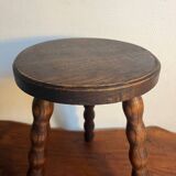 Round wooden tripod stool