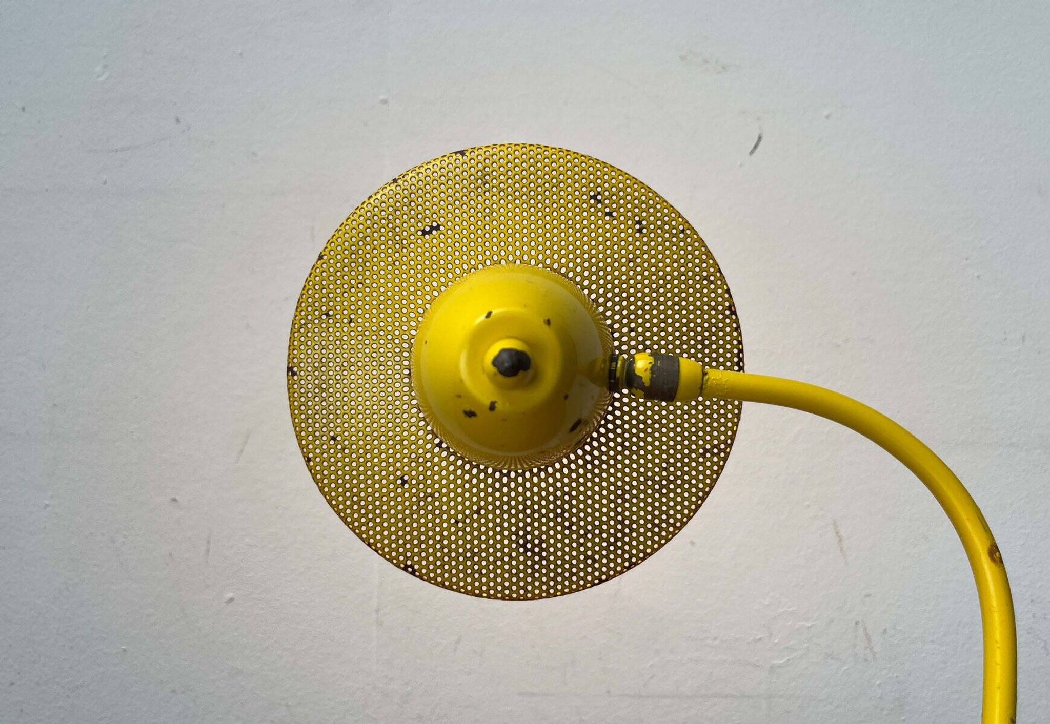Perforated metal table lamp in Mid-Century Modern style, in the style of Mathieu Matégot, 1960s.