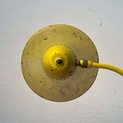 Perforated metal table lamp in Mid-Century Modern style, in the style of Mathieu Matégot, 1960s.