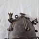 African bronze mask on pedestal, from Ivory Coast, dating