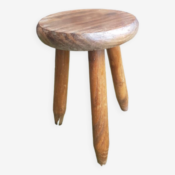 Old vintage wooden tripod milking stool