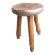 Old vintage wooden tripod milking stool