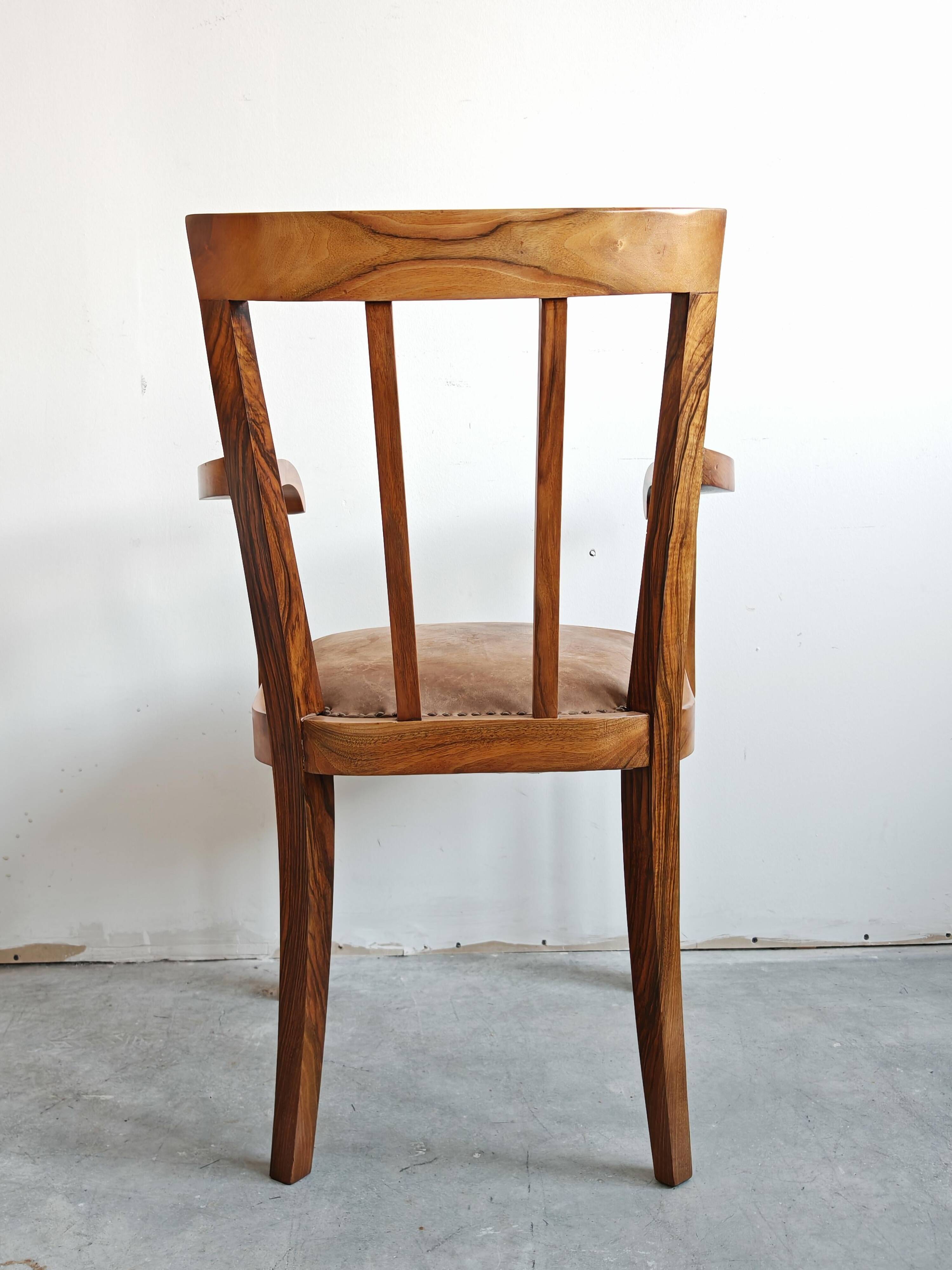 Pair of Art Deco armchairs in solid walnut and leather, 1920s