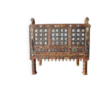 Antique wedding furniture from Rajasthan in carved wood, with inlays.