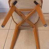 Set of 4 vintage chairs, in beech and imitation leather.