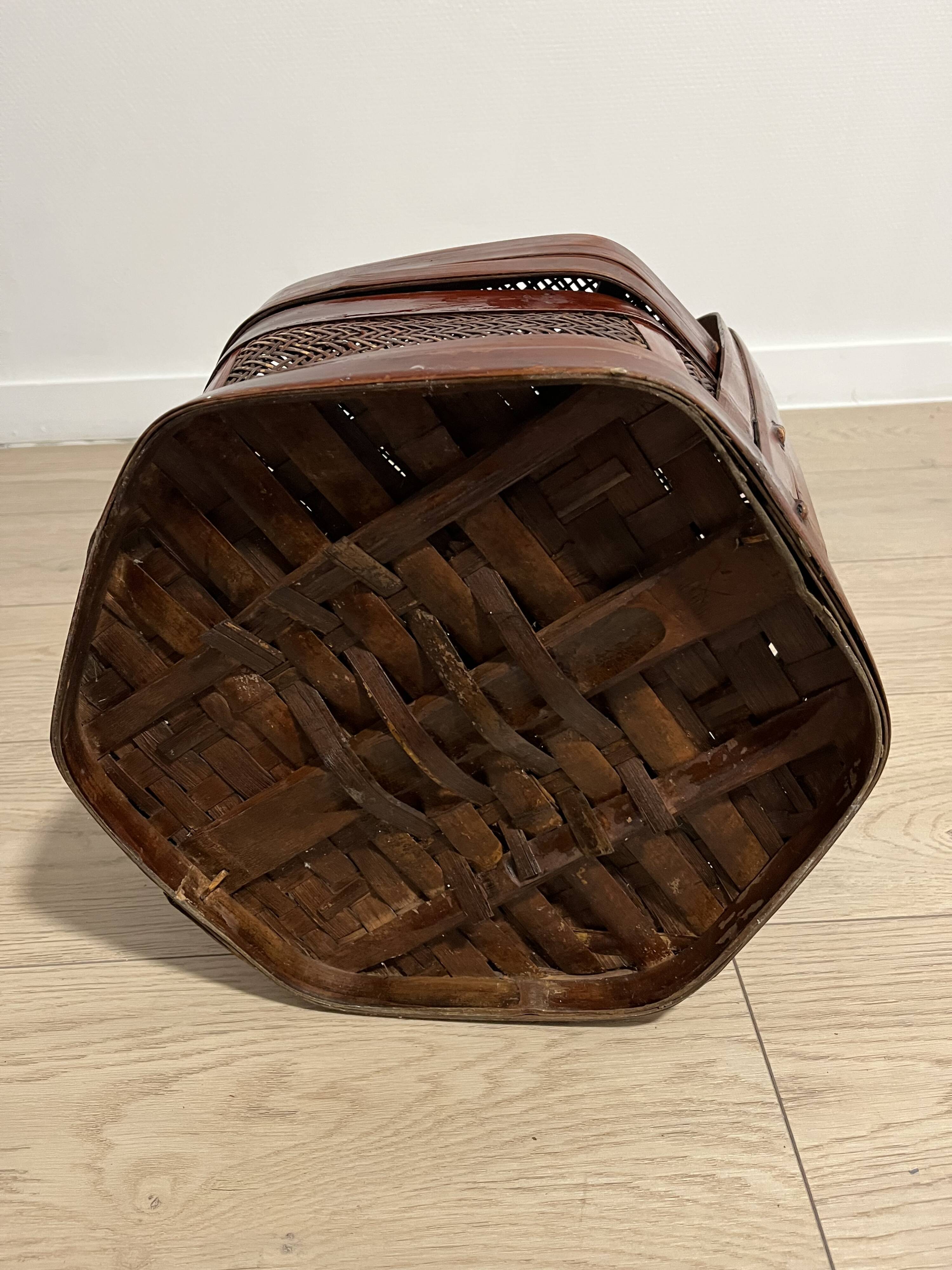 Ancient wooden and woven wicker basket,