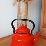 Red enameled teapot