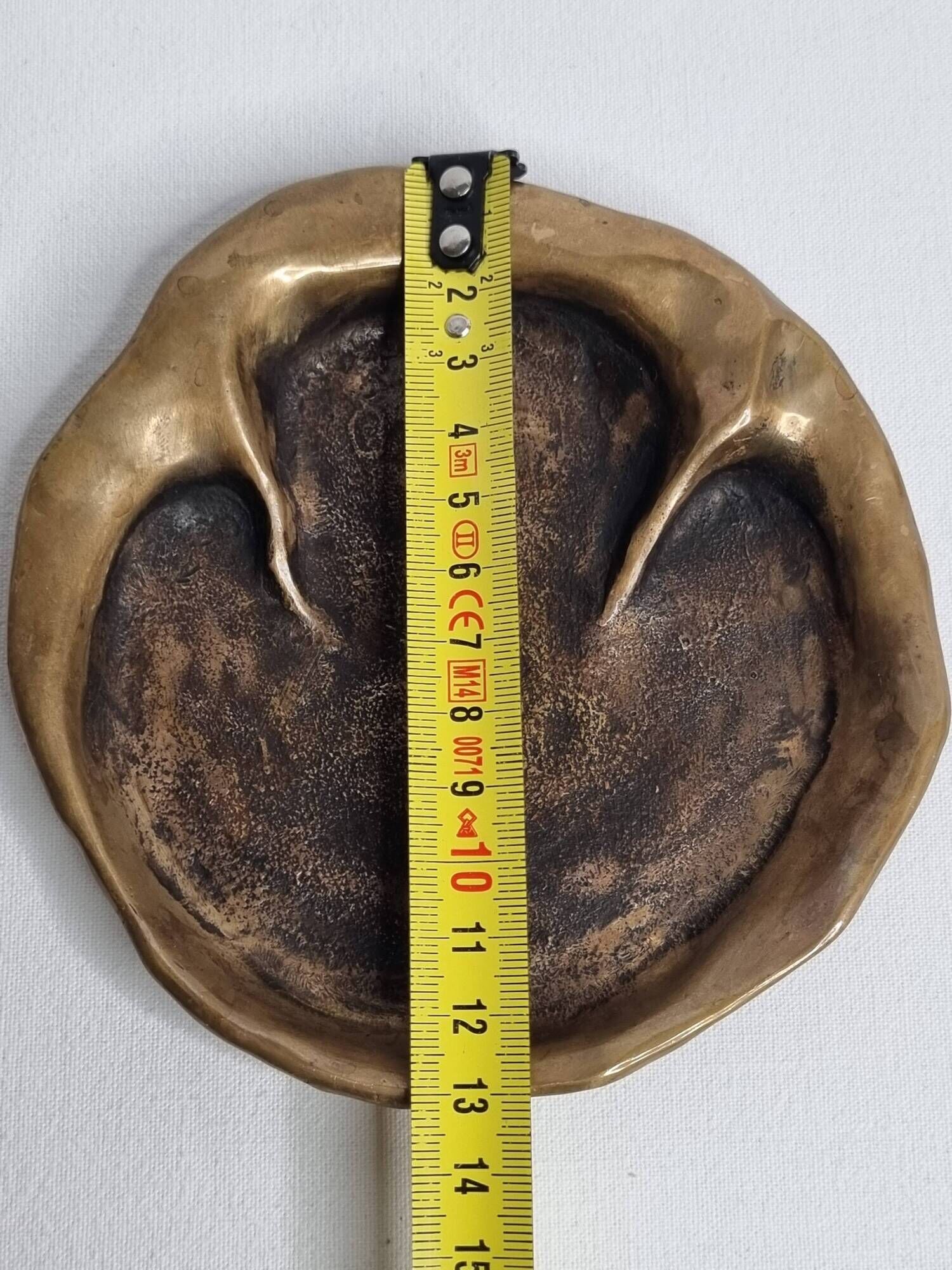Bronze pocket emptier by Denis Mathews (1913-1997), "Rhinoceros Footprint" (12 cm), 1995