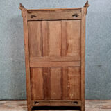 Louis Philippe period wardrobe (nineteenth) entirely covered with gilded bronzes