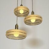 Triple cascade pendant light with vintage frosted glass globes and gold finish