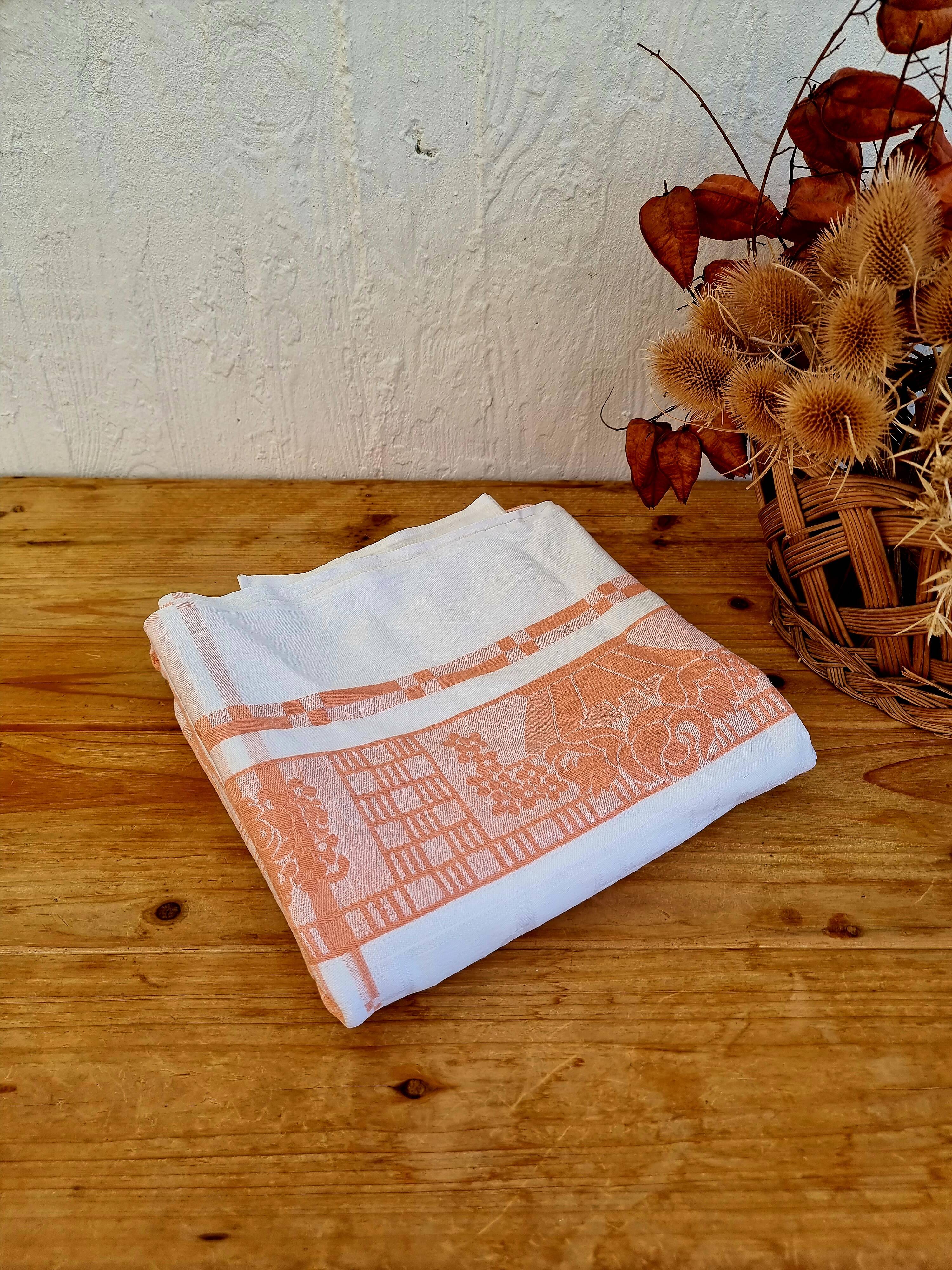 Antique orange and white damask tablecloth