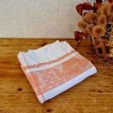 Antique orange and white damask tablecloth