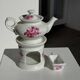 Complete porcelain teapot and warmer with pink floral decoration H18