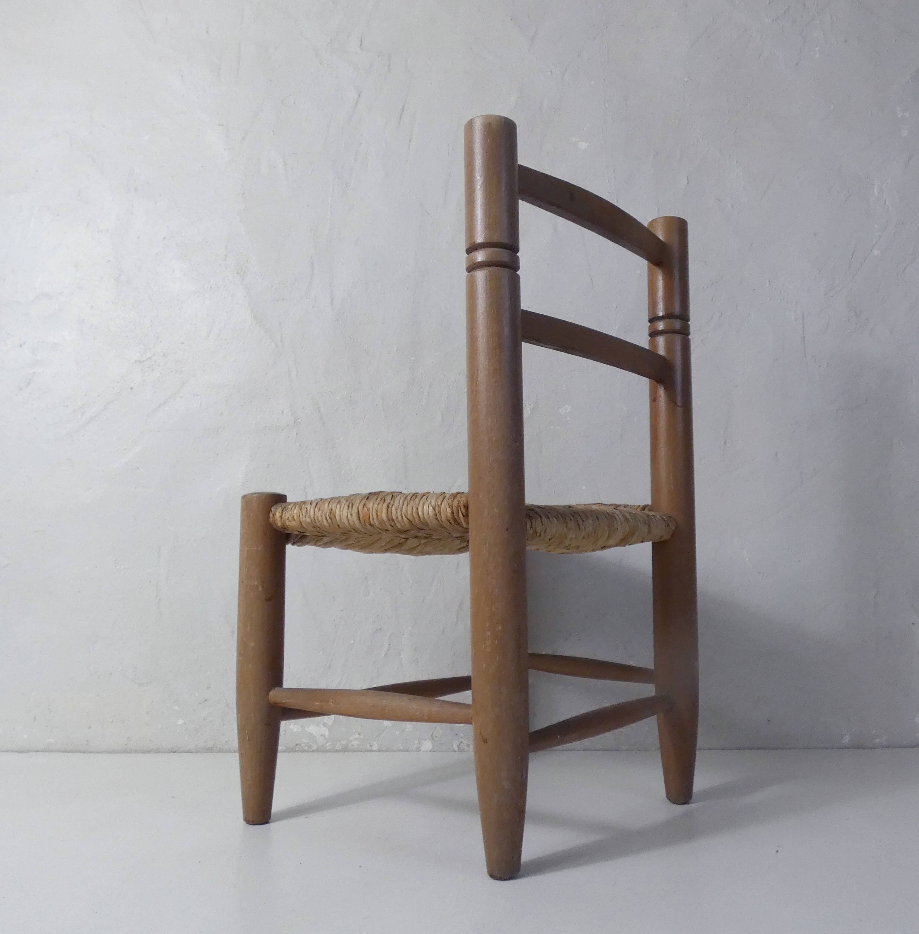 Old wooden straw chair for children