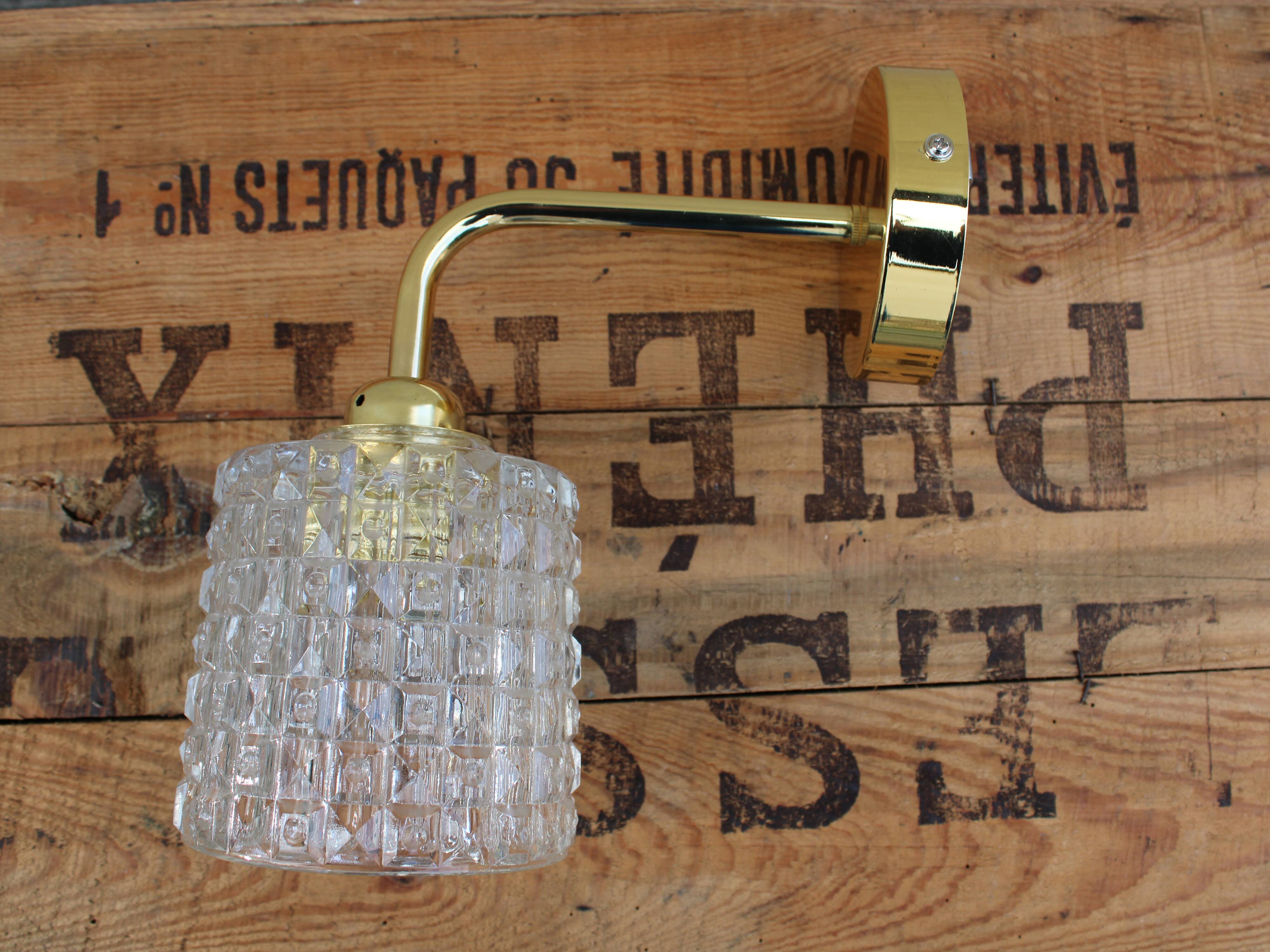 Brass and moulded glass sconce