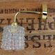 Brass and moulded glass sconce