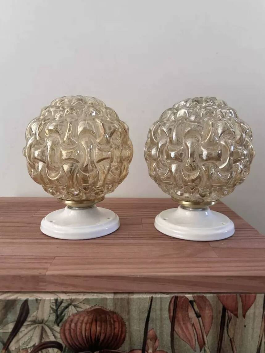 Pair of golden Scandinavian globe wall lights