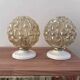 Pair of golden Scandinavian globe wall lights