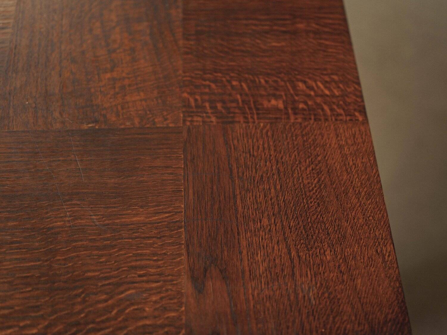 Modernist oak table with a checkerboard top, France, circa 1940.