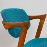 Pair of 42 Kai Kristiansen teak chairs in original blue bouclé upholstery, Denmark, 60s.
