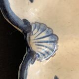 Old dish mounted in ceramic, scallop