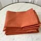 Lot de 8 serviettes de table en lin ajourées couleur terracotta