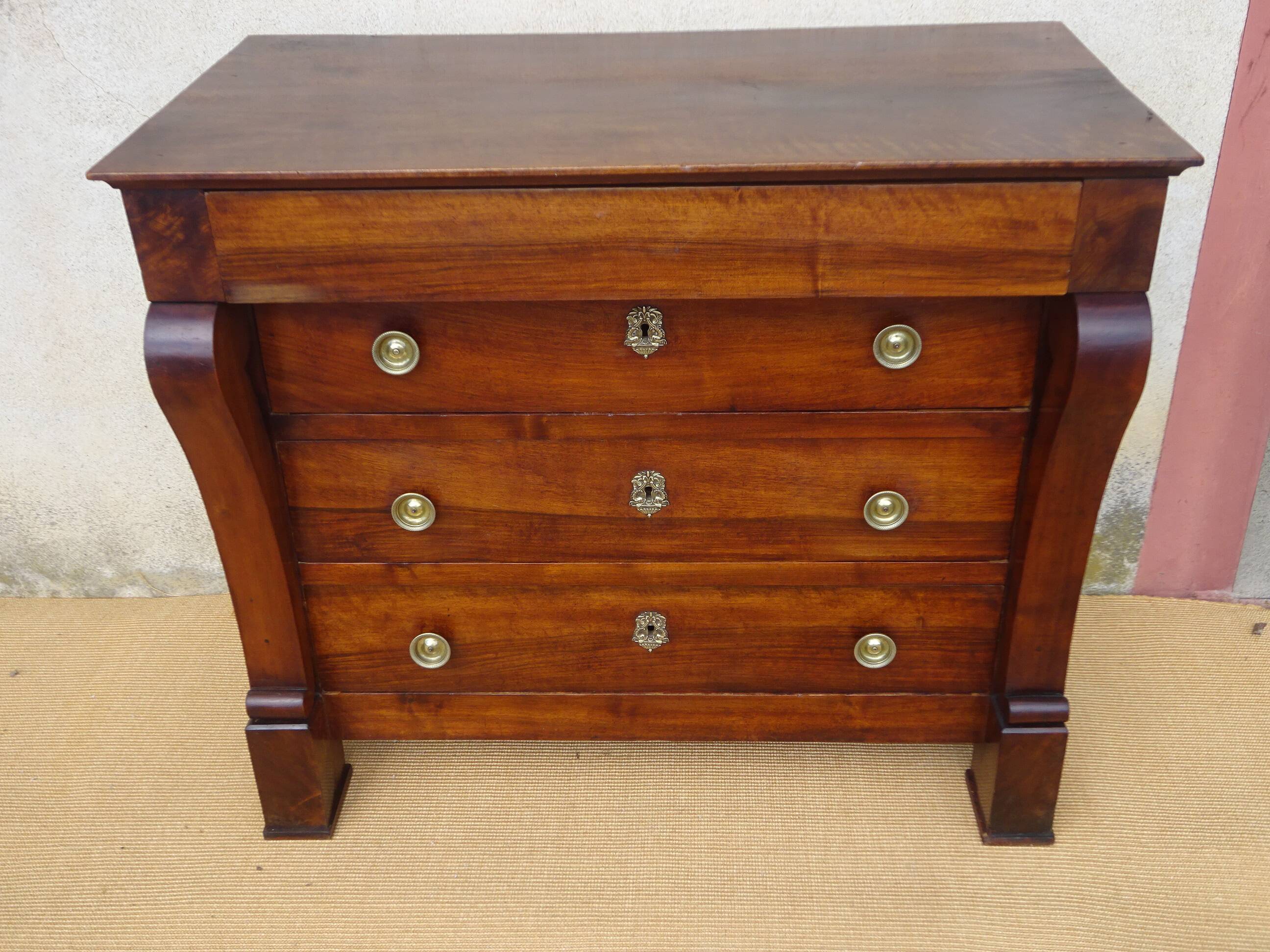 Very old walnut chest of drawers.