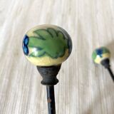 Metal and flowered ceramic coat hooks