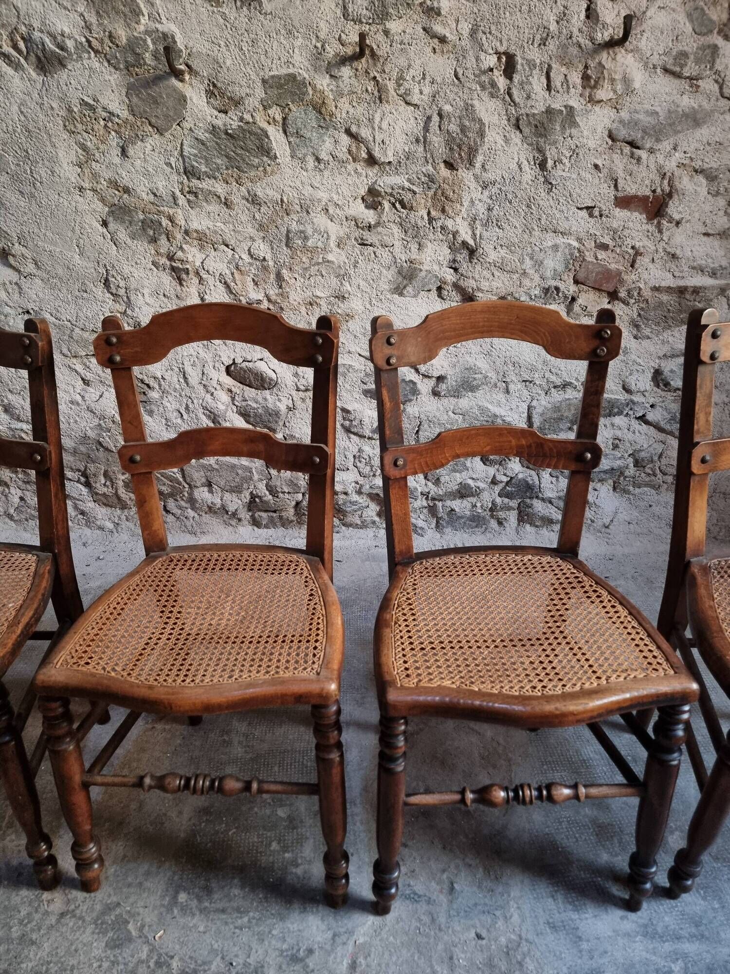 Set of 4 antique dining chairs with caned seats, beech, France, circa 1900–1920.