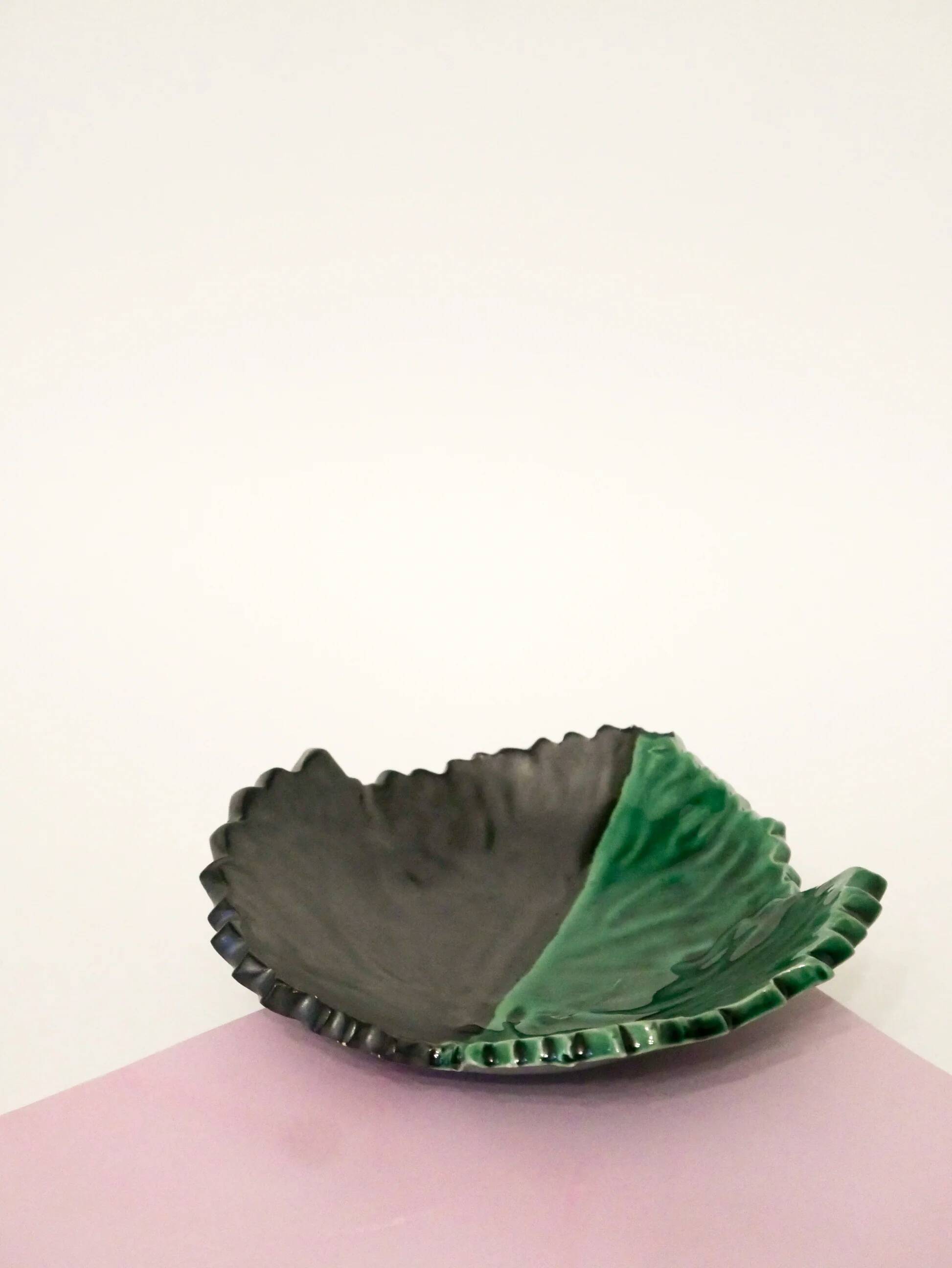 Two-tone ceramic leaf dish, green and black, signed, 1960.