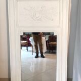 Fireplace trumeau mirror decorated with the attributes of music