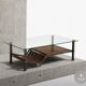 Brutalist coffee table in wrought iron and leather.