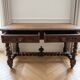 Antique solid wood carved desk in Louis XIII style.