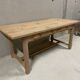 Large solid wood table with a sleek design – integrated storage.