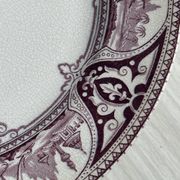 Antique plate with purple oriental decoration