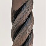 Pair of sculptural cast iron chenets with twisted heads