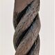 Pair of sculptural cast iron chenets with twisted heads