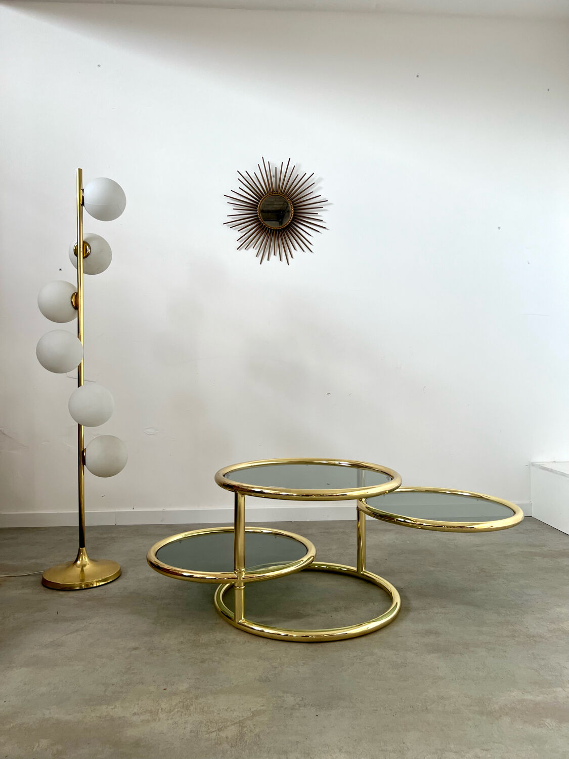 Three-level swivel coffee table in morex design brass Milo Baughman italy