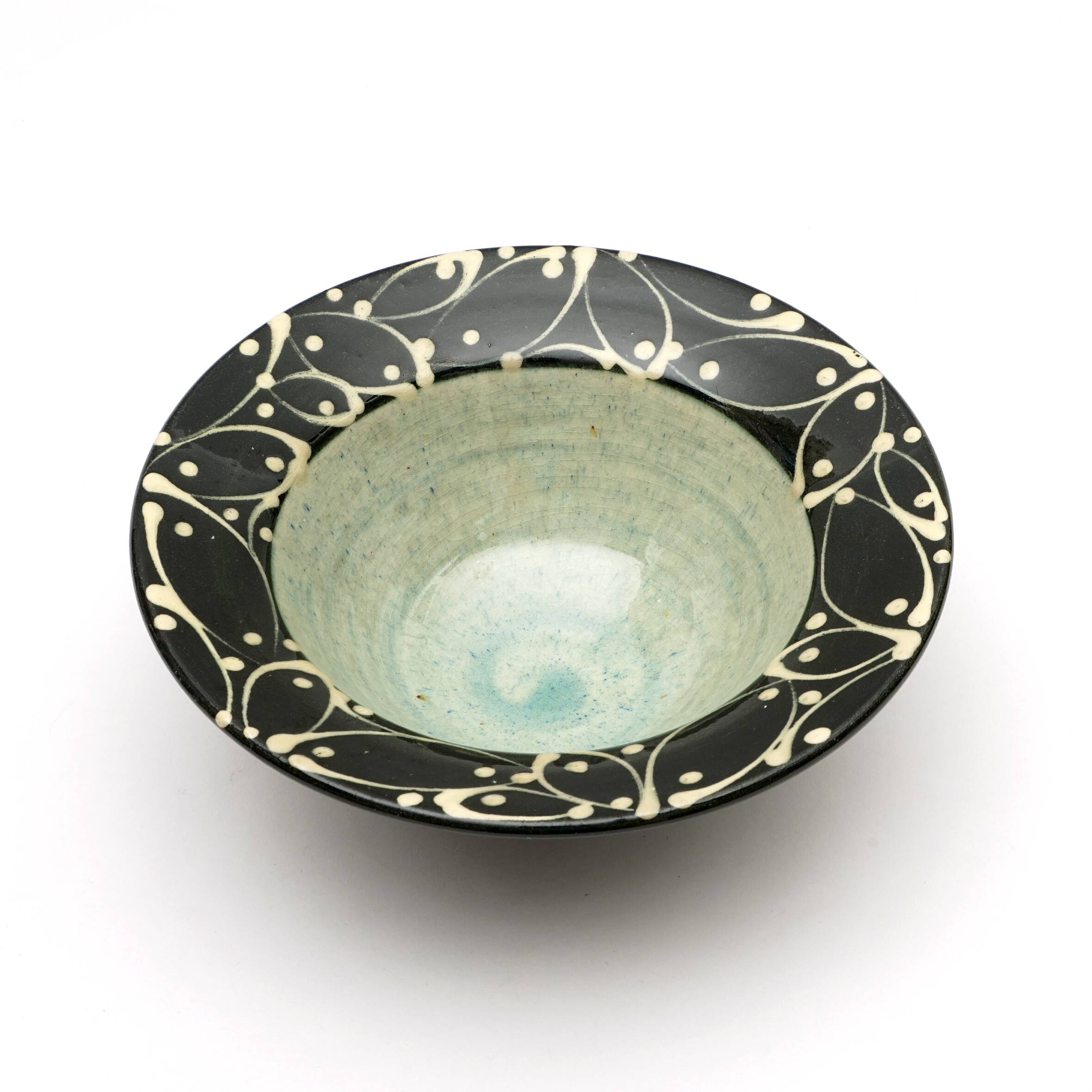 Hand-painted glazed earthenware cup