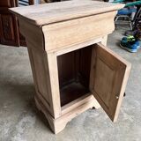 Raw wood bedside table