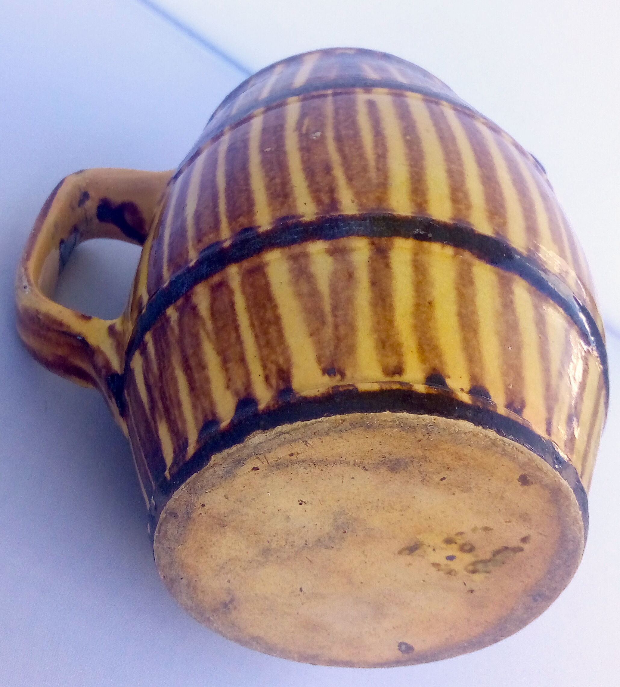 Country pitcher in ceramic yellow & brown stripes